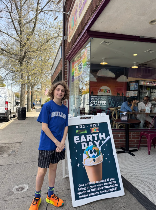 Louis Simon in front of Smusht Ice Cream shop in Port Washington, who he partnered with for a bring-your-own-spoon event.